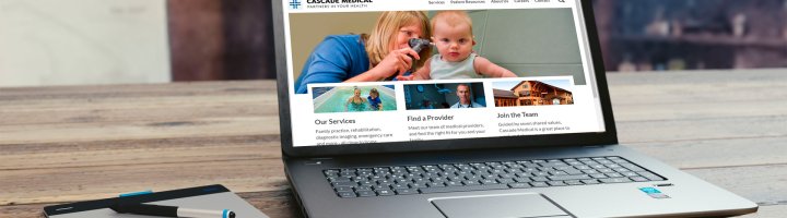 The new cascademedical.org is displayed on a laptop.