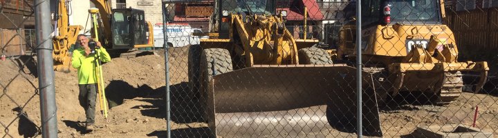 A construction worker at the site of the Commercial Street lot